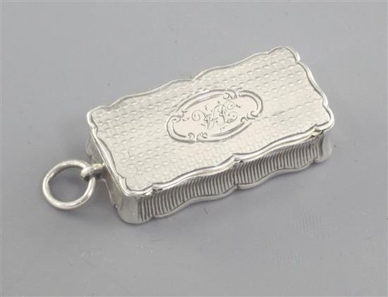 A Victorian engine turned silver rectangular combination vinaigrette/vesta by Aston & Son, 30 mm.